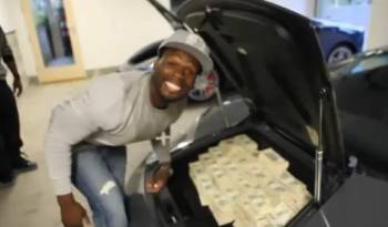 Video: 50 Cent stacks 2 Million USD in his Lambo