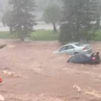 Video: Australian Flood Washing Away Cars in Parking Lot