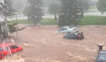 Video: Australian Flood Washing Away Cars in Parking Lot