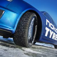 Audi RS6 with Nokian Tyres Beats Bentley World Record On Ice