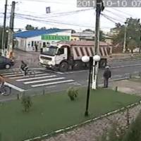 Video: Bicycle Rider Almost Crushed by Truck