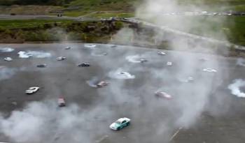 World Record: 75 Cars Simultaneously Doing Donuts
