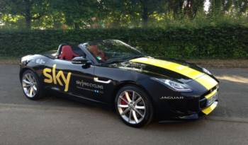 Chris Froome receives a Jaguar F-Type
