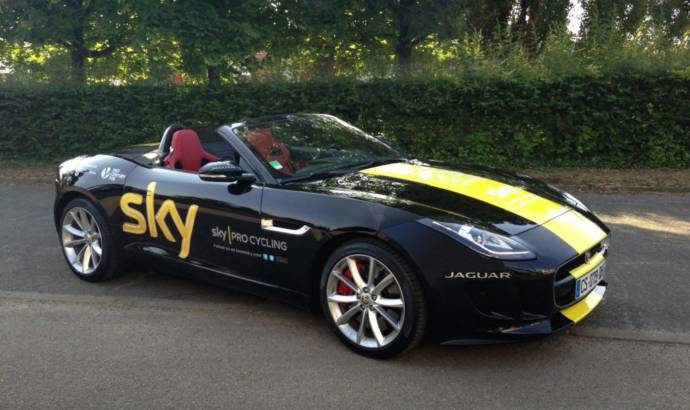 Chris Froome receives a Jaguar F-Type