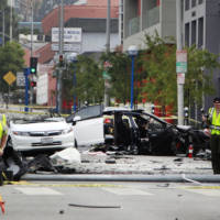 A stolen Tesla Model S crashed, splits in two and bursts into flames after a massive chase