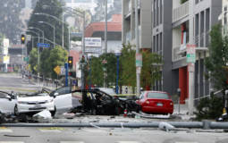 A stolen Tesla Model S crashed, splits in two and bursts into flames after a massive chase