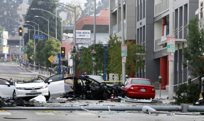 A stolen Tesla Model S crashed, splits in two and bursts into flames after a massive chase