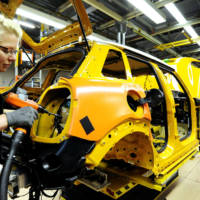 First Mini five-door hatchback rolls off the assembly line in Oxford