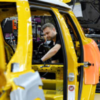 First Mini five-door hatchback rolls off the assembly line in Oxford