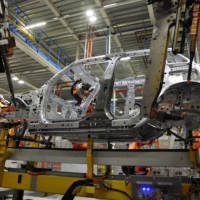 First Mini five-door hatchback rolls off the assembly line in Oxford