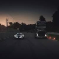 Volvo FH Truck on the racetrack against Koenigsegg One 1