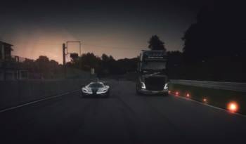 Volvo FH Truck on the racetrack against Koenigsegg One 1