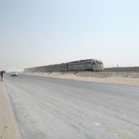 Bentley Continental GT V8 S Convertible races a train in the desert