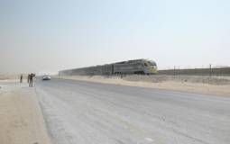 Bentley Continental GT V8 S Convertible races a train in the desert