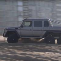 Mercedes G63 AMG 6x6 power sliding on a Belgium beach