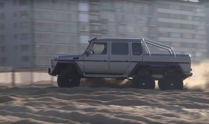 Mercedes G63 AMG 6x6 power sliding on a Belgium beach