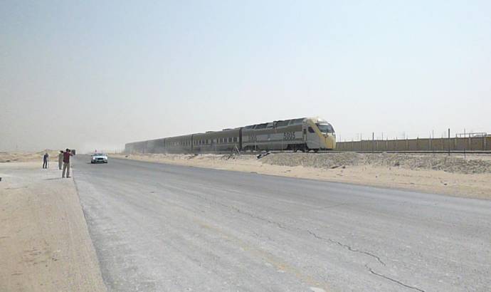 Bentley Continental GT V8 S Convertible races a train in the desert