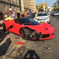 Ferrari LaFerrari hits three parked cars