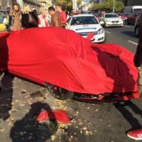 Ferrari LaFerrari hits three parked cars