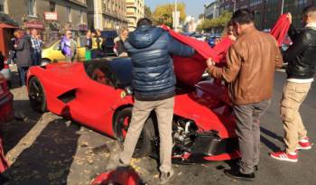 Ferrari LaFerrari hits three parked cars