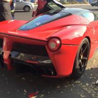 Ferrari LaFerrari hits three parked cars