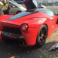 Ferrari LaFerrari hits three parked cars