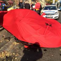 Ferrari LaFerrari hits three parked cars