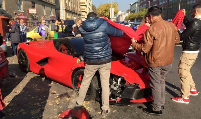 Ferrari LaFerrari hits three parked cars