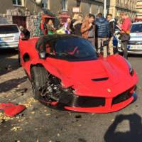 Ferrari LaFerrari hits three parked cars