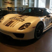 A Porsche 918 Spyder was stolen from a dealer. In broad daylight