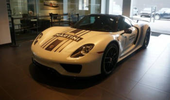 A Porsche 918 Spyder was stolen from a dealer. In broad daylight