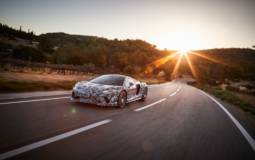 Upcoming McLaren Grand Tourer teased with some camouflaged pictures