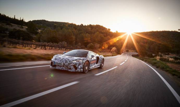 Upcoming McLaren Grand Tourer teased with some camouflaged pictures